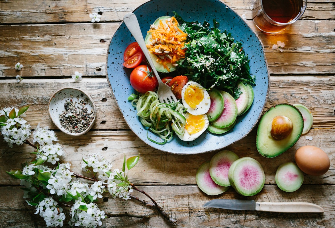Mediterranean spreads with hummus, olives, vegetables, and whole grain bread